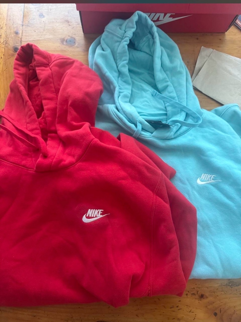 Nike Kids Hoodies in Red and Light Blue medium and a large